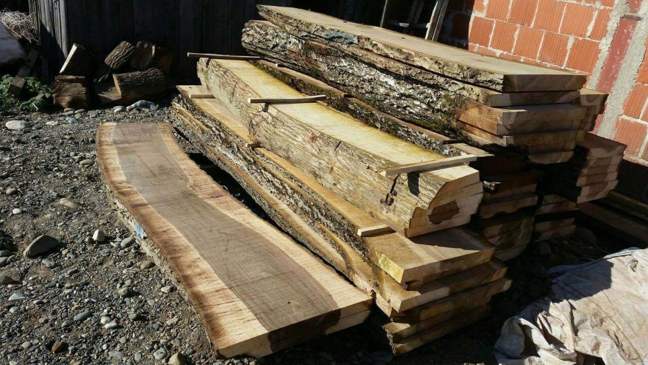Unedged walnut wood lumber
